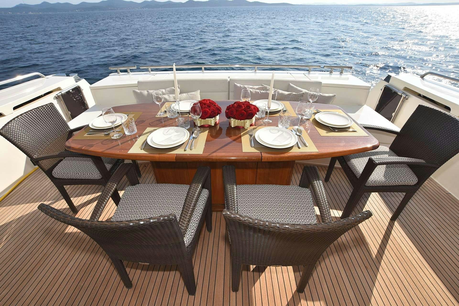 a table on a boat aboard TESORO Yacht for Charter