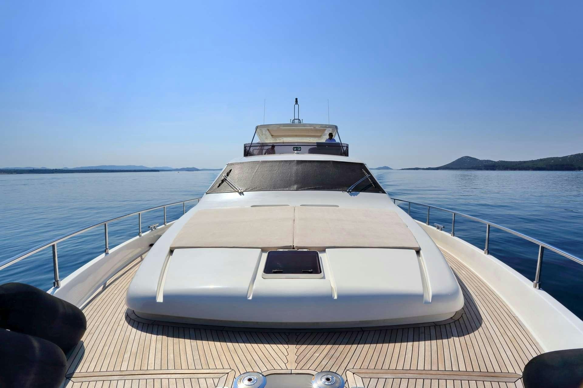 a boat on a body of water aboard TESORO Yacht for Charter