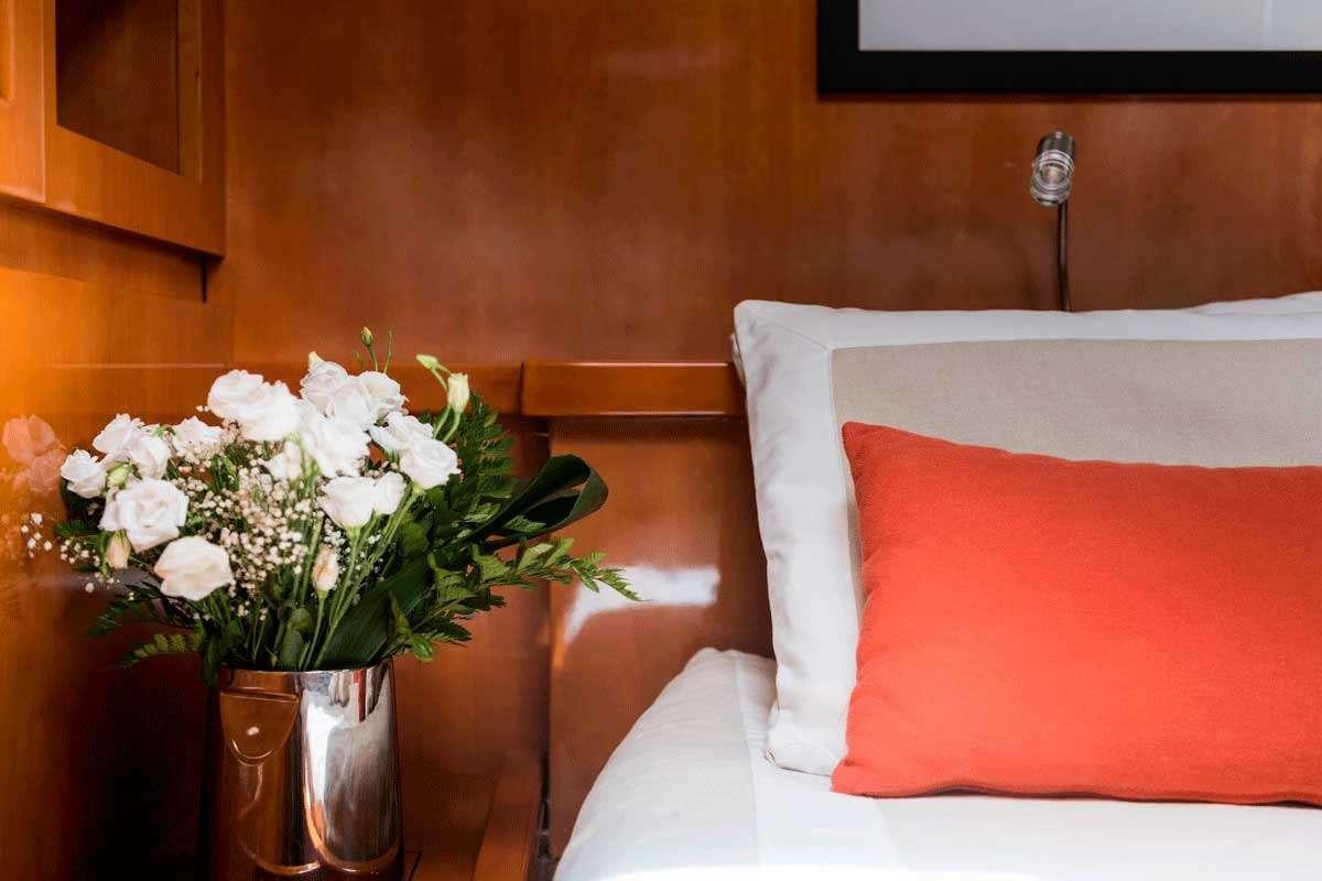 a vase of white flowers aboard LOGICA/QUINTA SANTA MARIA Yacht for Charter