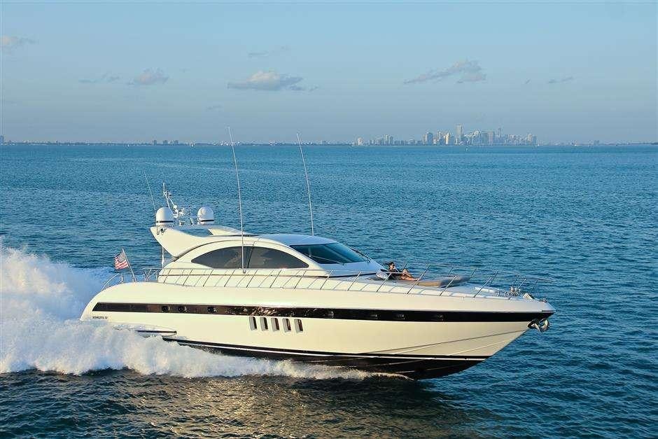 a white boat on the water aboard YCM Yacht for Charter