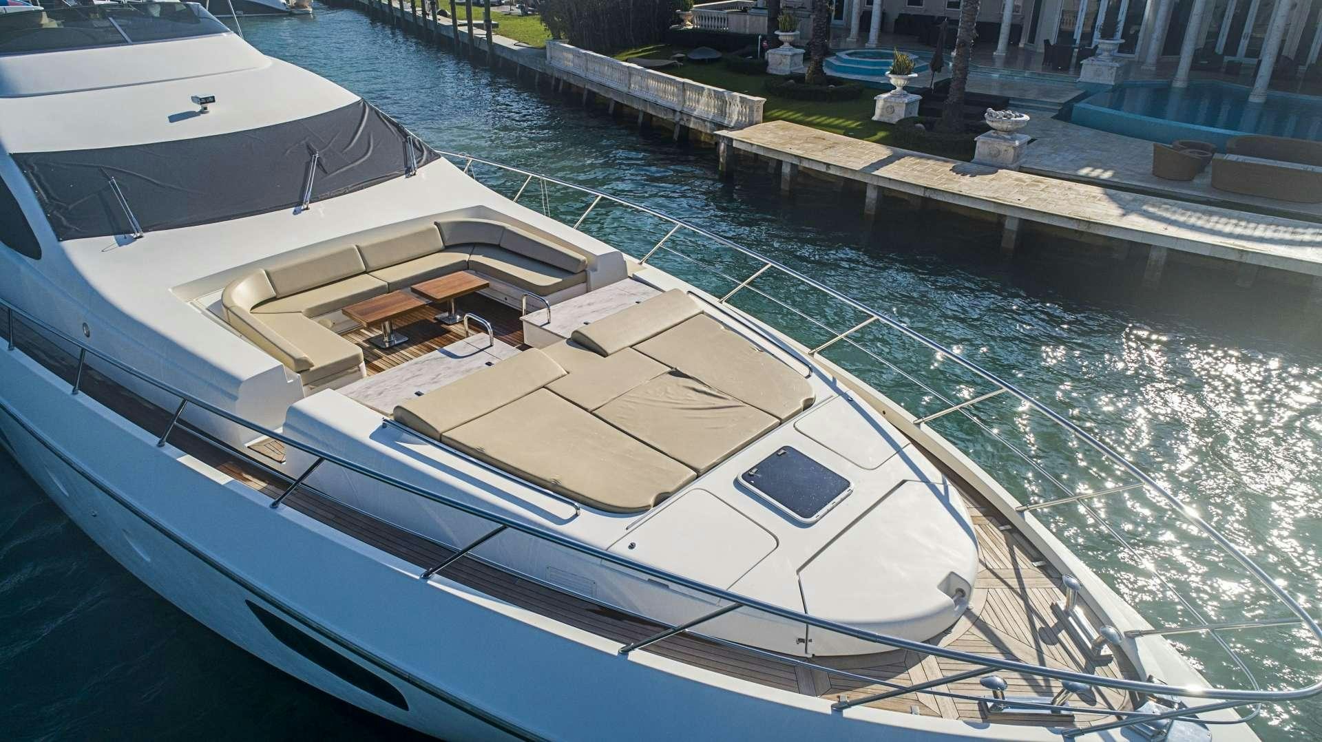 a boat parked in a harbor aboard INTERVENTION Yacht for Charter