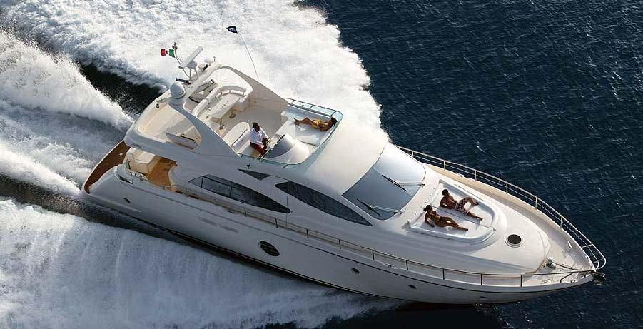 a white boat on the water aboard JULY Yacht for Charter