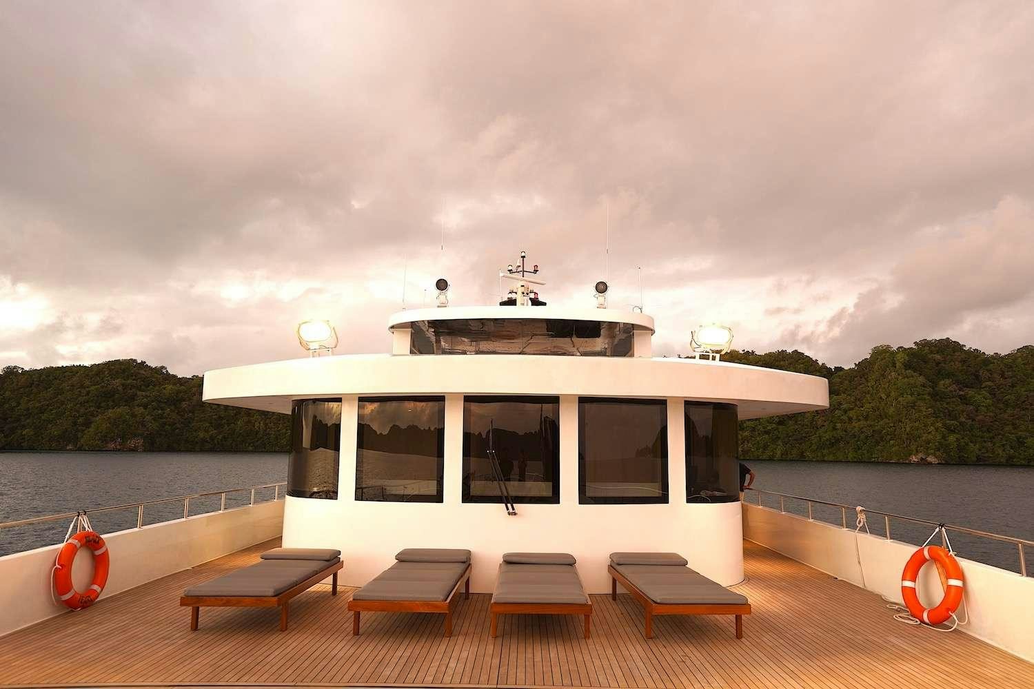 a boat on a body of water aboard BLACK PEARL I Yacht for Charter
