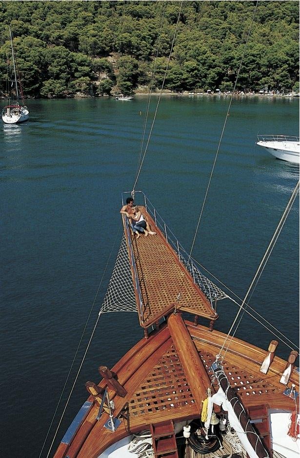 a group of people on a boat aboard MATINA Yacht for Charter