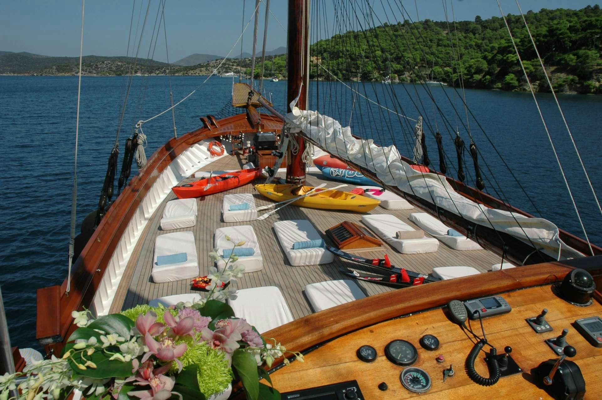 a boat with a flower bed aboard MATINA Yacht for Charter