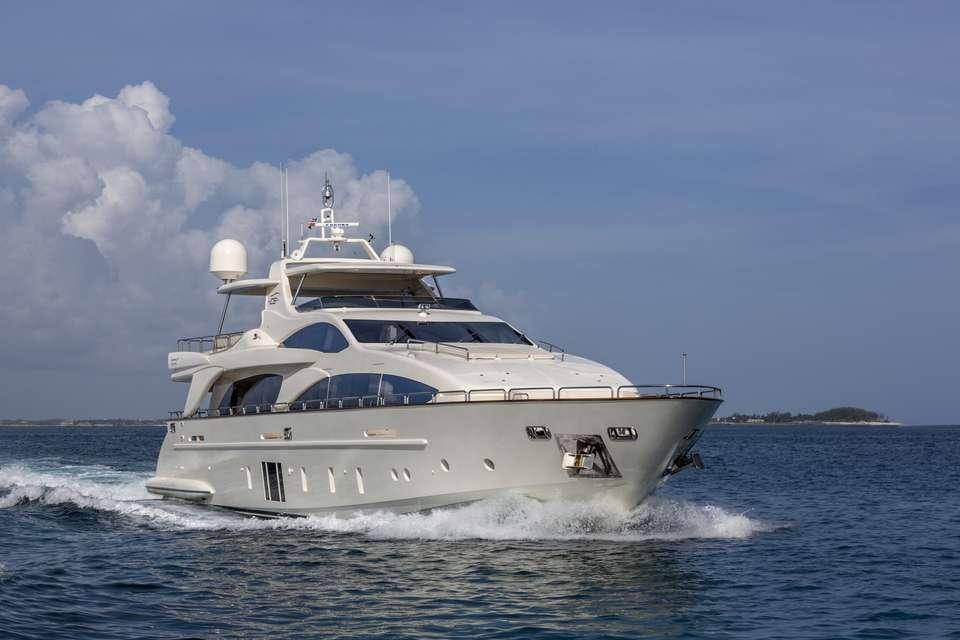 a white yacht on the water aboard INSIEME Yacht for Charter