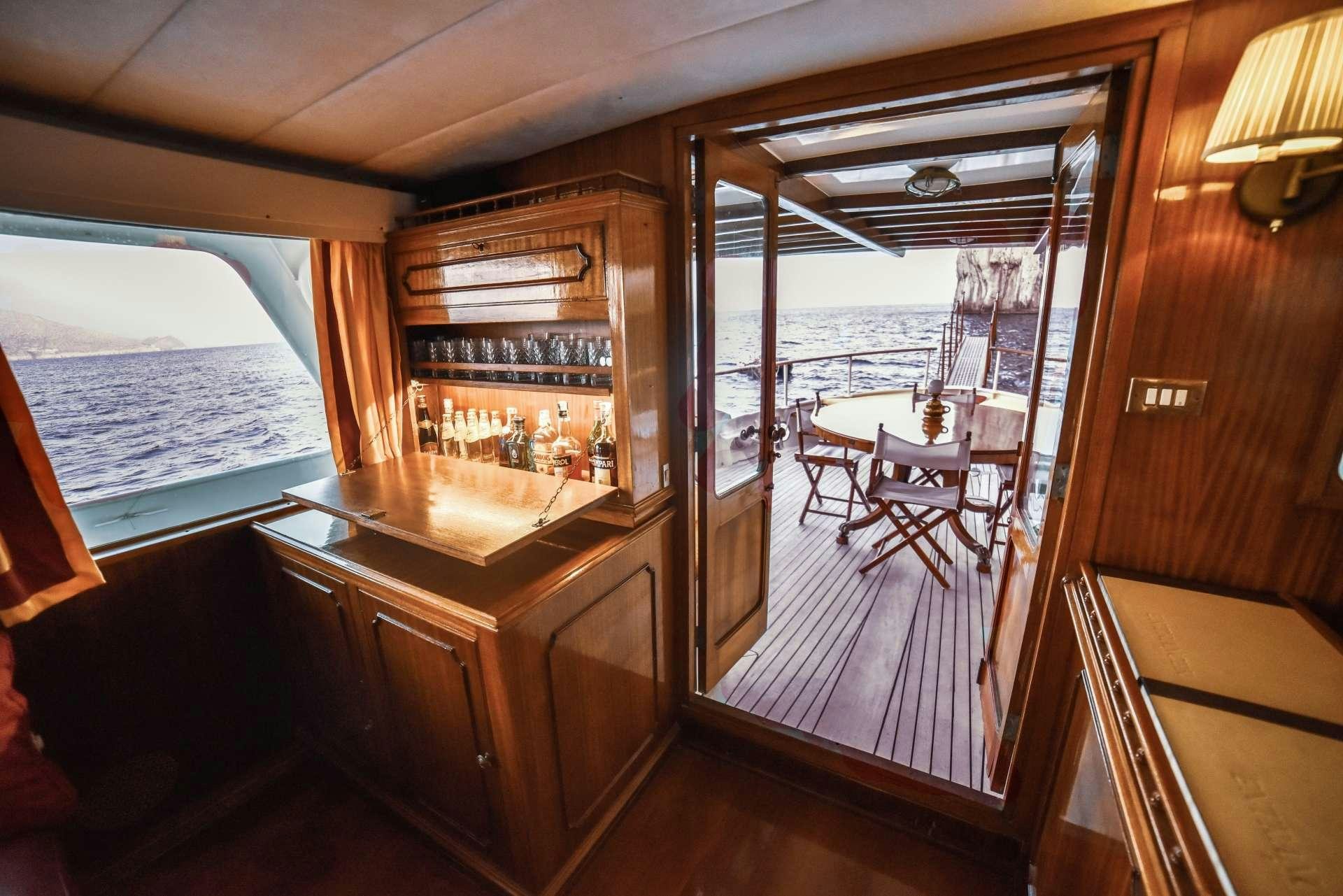a cabin with a view of the ocean aboard ENTRANCER Yacht for Charter