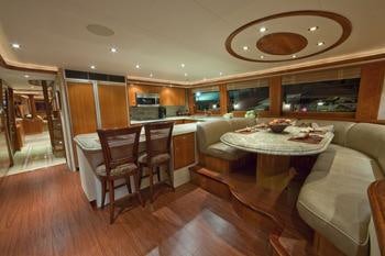 a kitchen and dining area aboard ALICIA Yacht for Charter