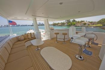 a large living room with a large pool and a deck aboard ALICIA Yacht for Charter