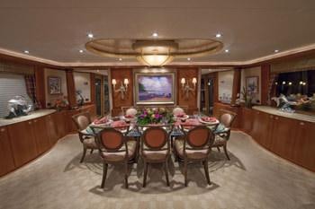 a dining room with a table and chairs aboard ALICIA Yacht for Charter