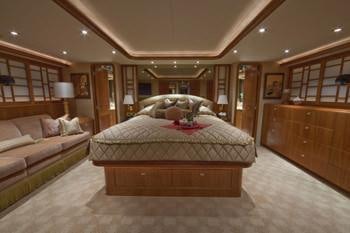 a large bedroom with a large bed aboard ALICIA Yacht for Charter