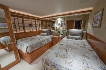 a couple of beds in a hotel room aboard ALICIA Yacht for Charter