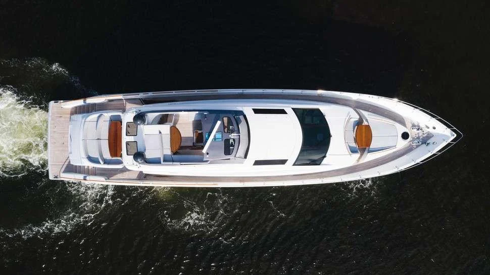 a white car with a door on it aboard HELIOS Yacht for Charter