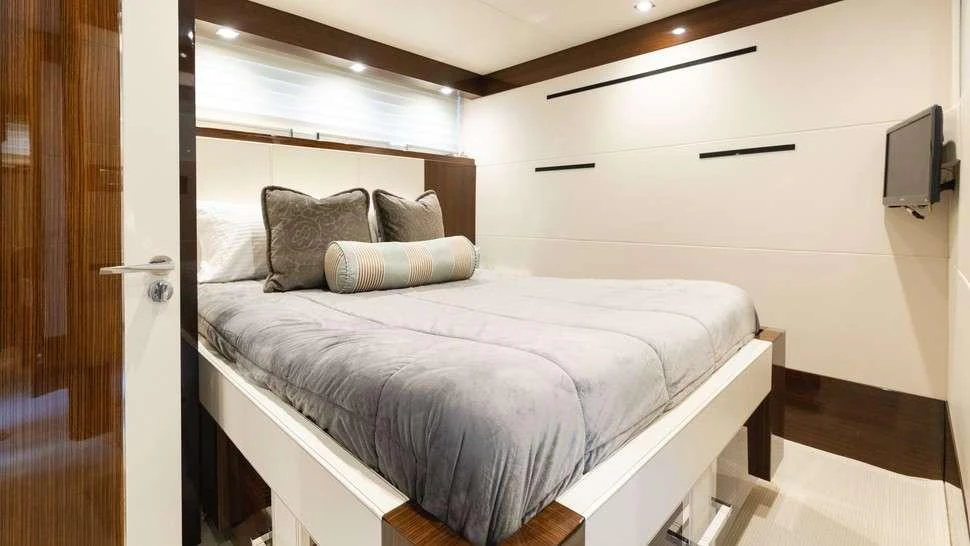 a bed in a room aboard HELIOS Yacht for Charter