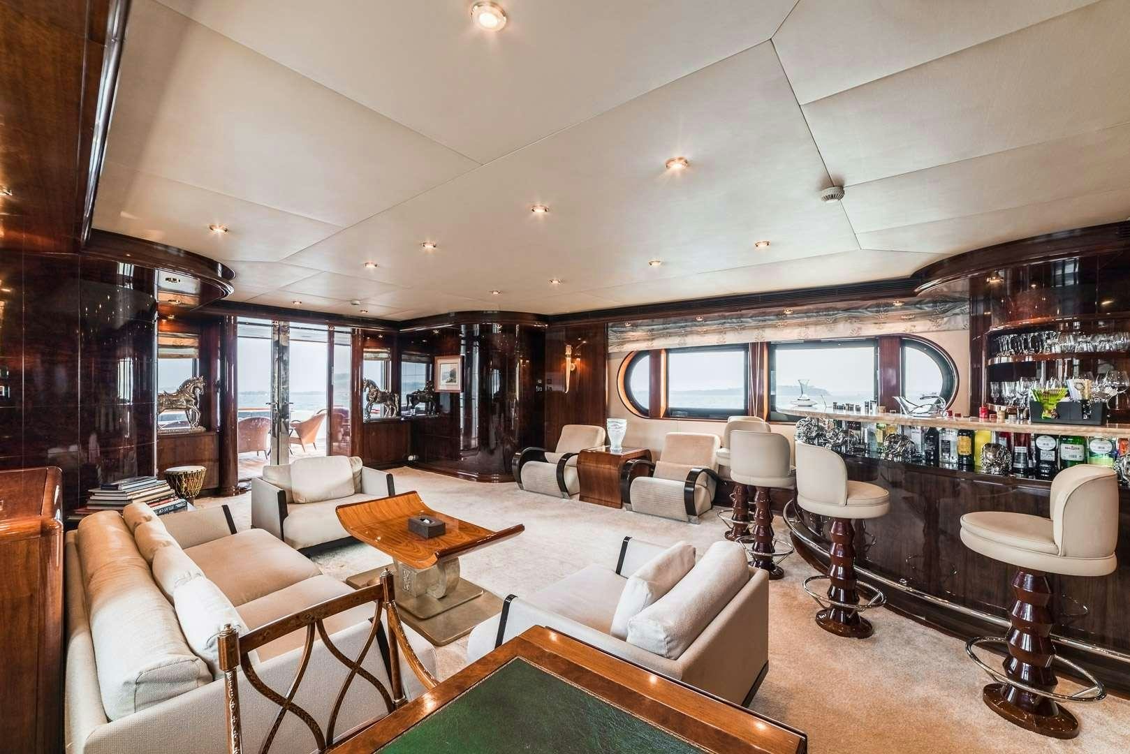 a living room with a large window aboard ASHENA Yacht for Charter