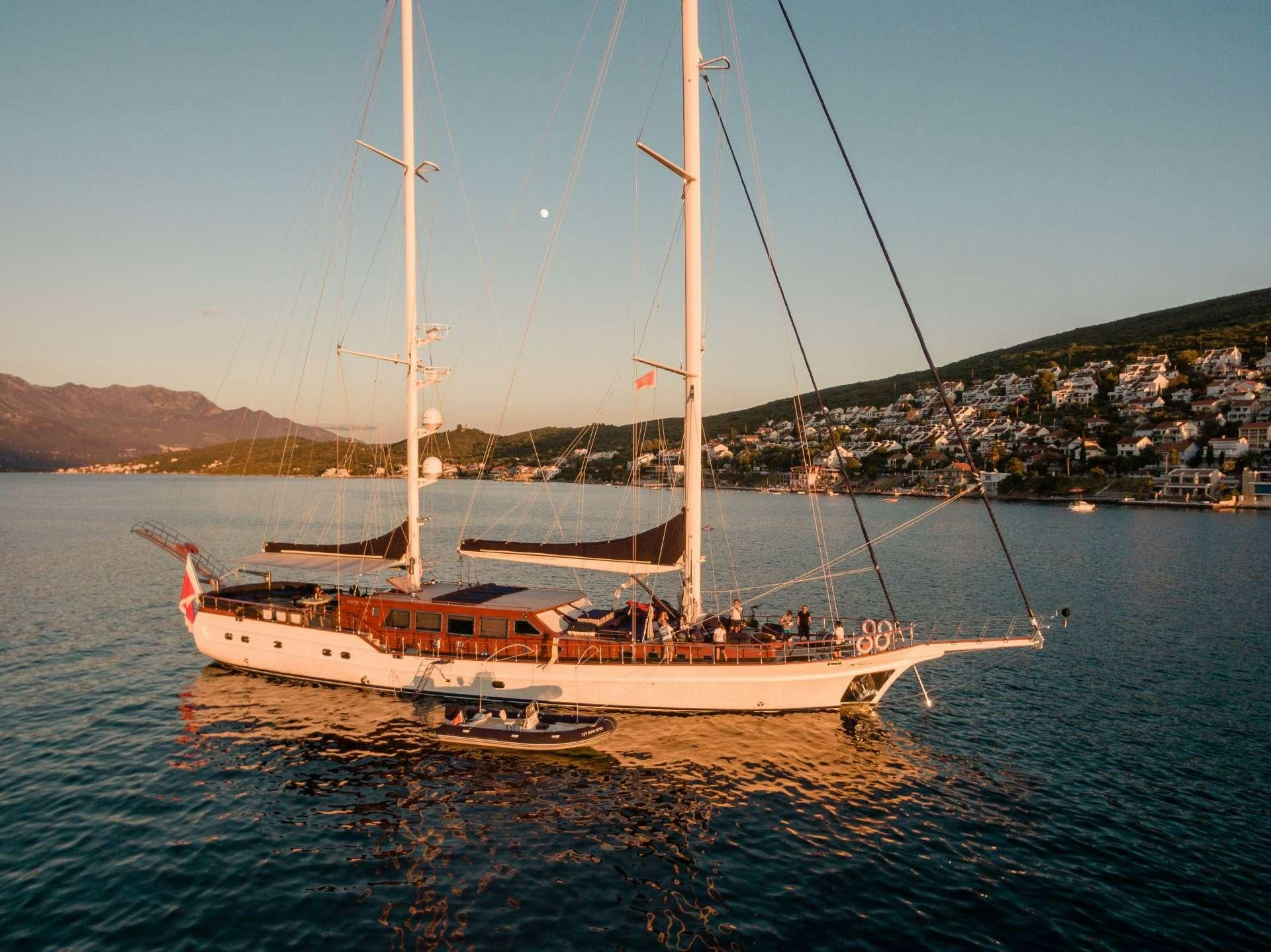 a boat sailing on the water aboard VOYAGE Yacht for Charter