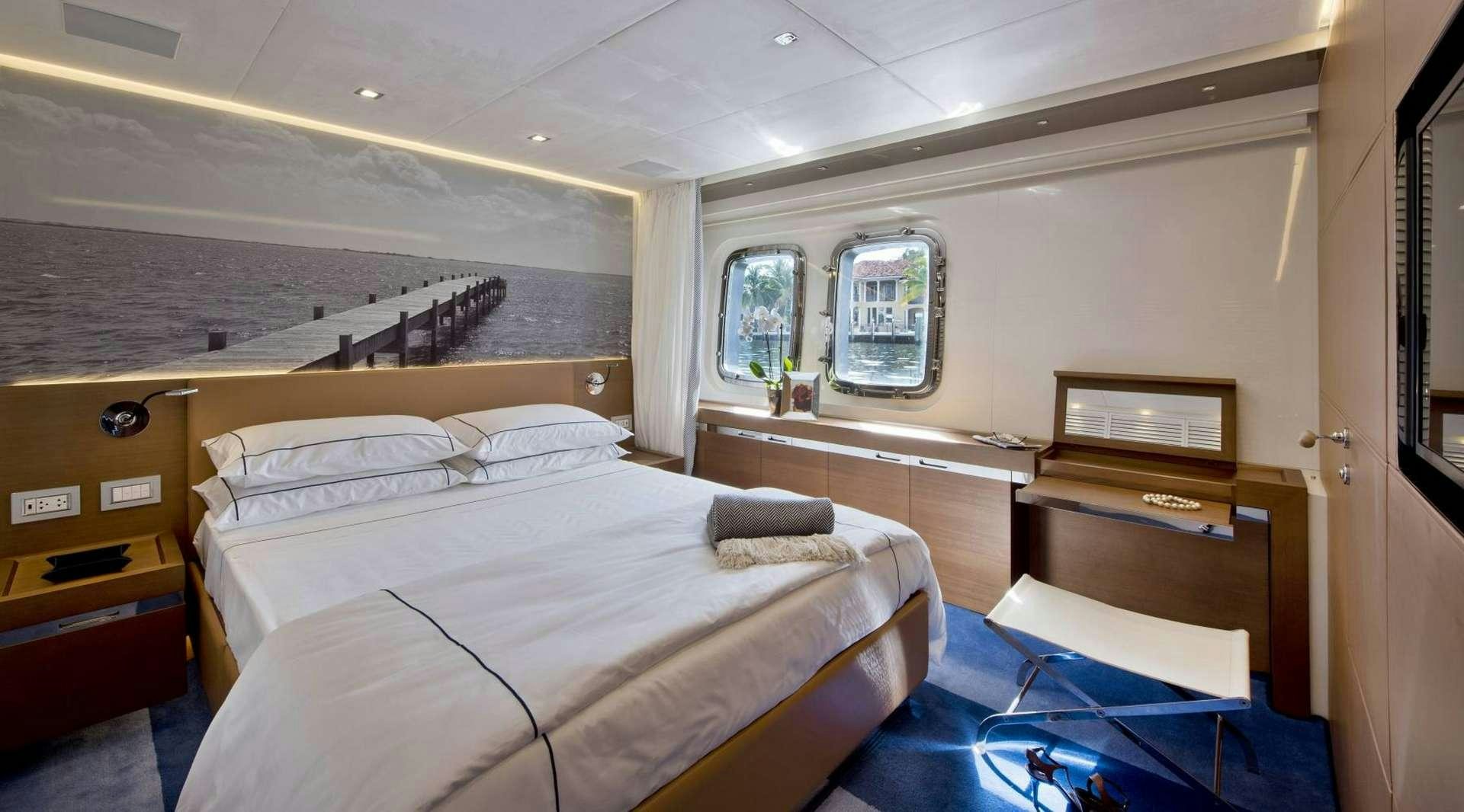 a room with two beds aboard MORNING STAR Yacht for Charter