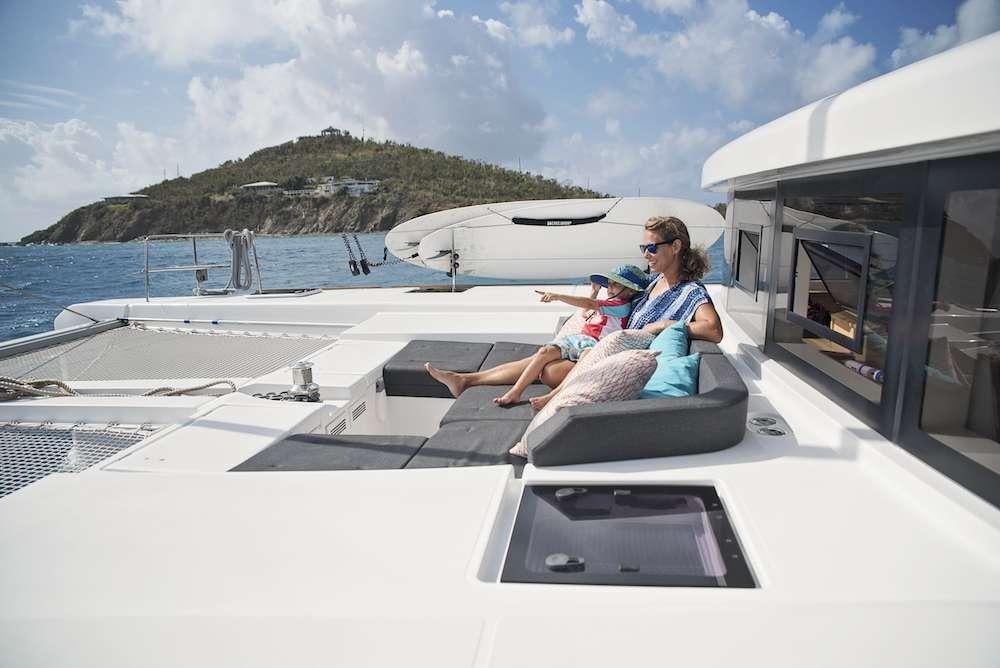 a couple sitting on a boat aboard SOUTHERN COMFORT Yacht for Charter