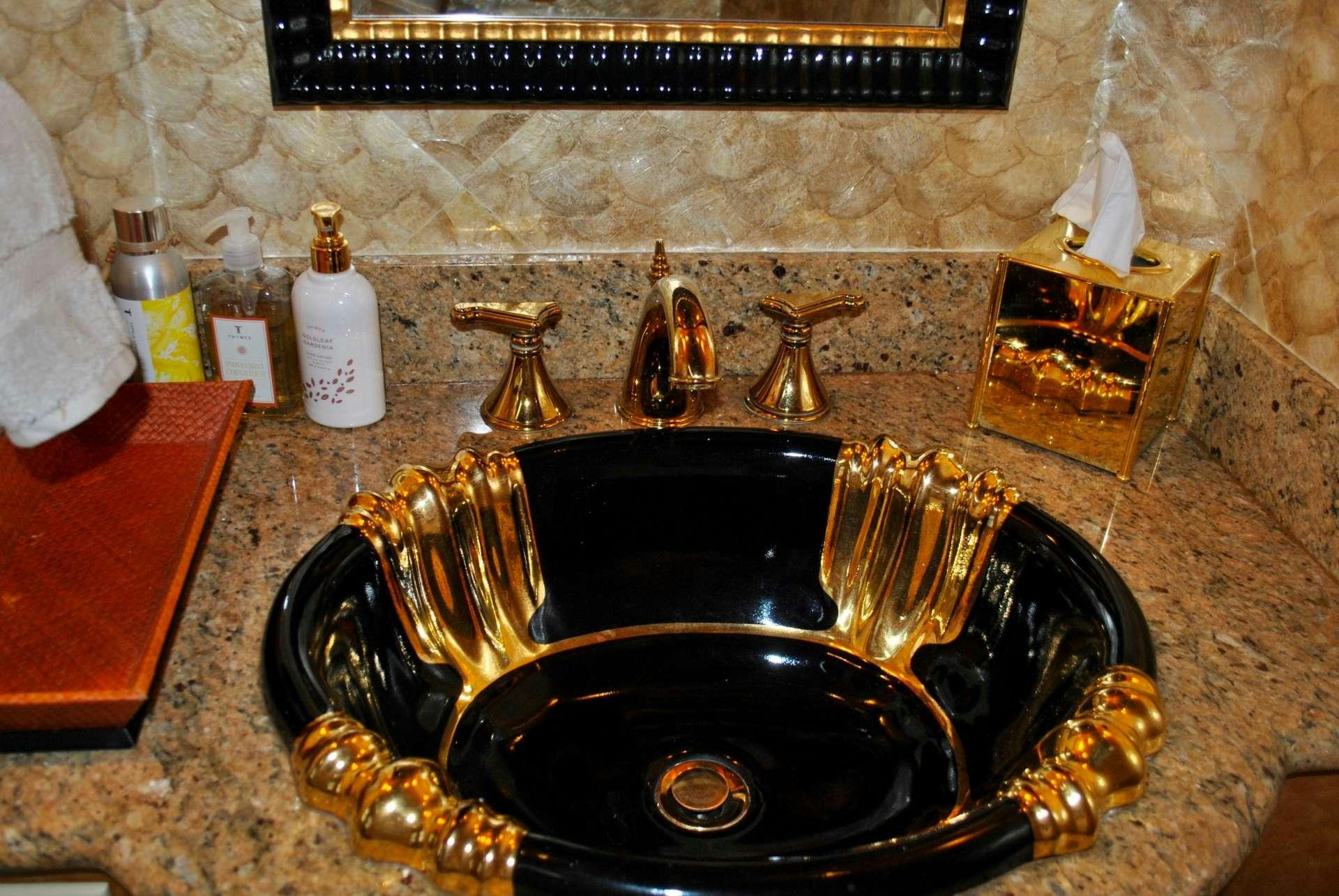 a sink with faucets aboard LADY LEX Yacht for Charter