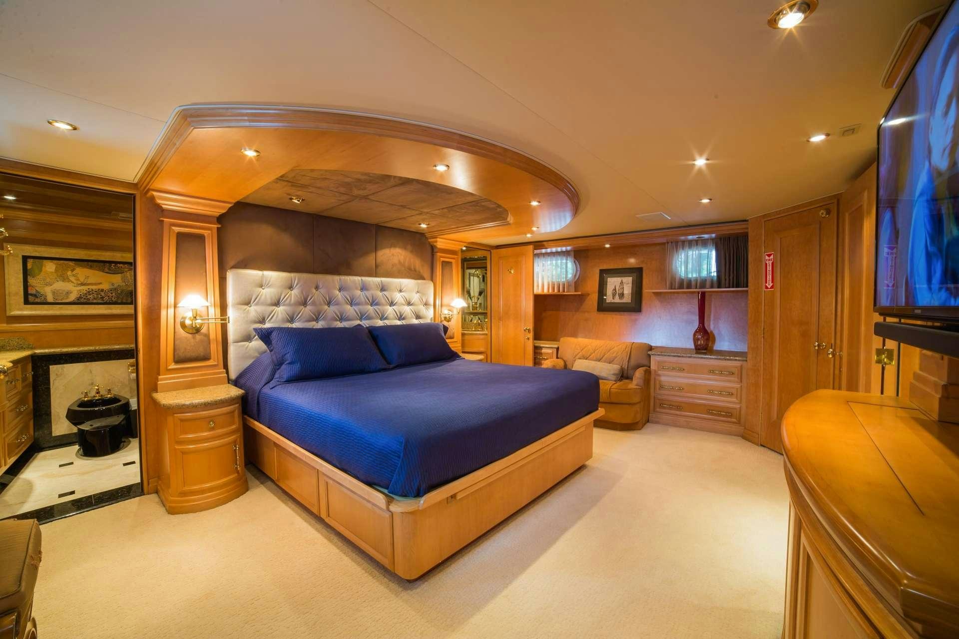 a large bedroom with a large bed aboard LADY LEX Yacht for Charter
