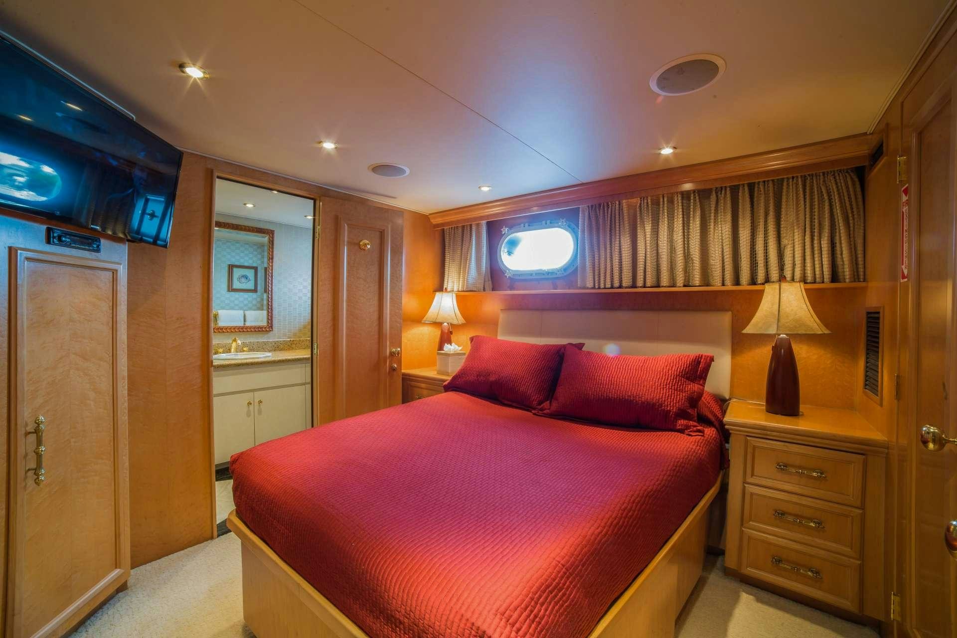 a bed in a room aboard LADY LEX Yacht for Charter