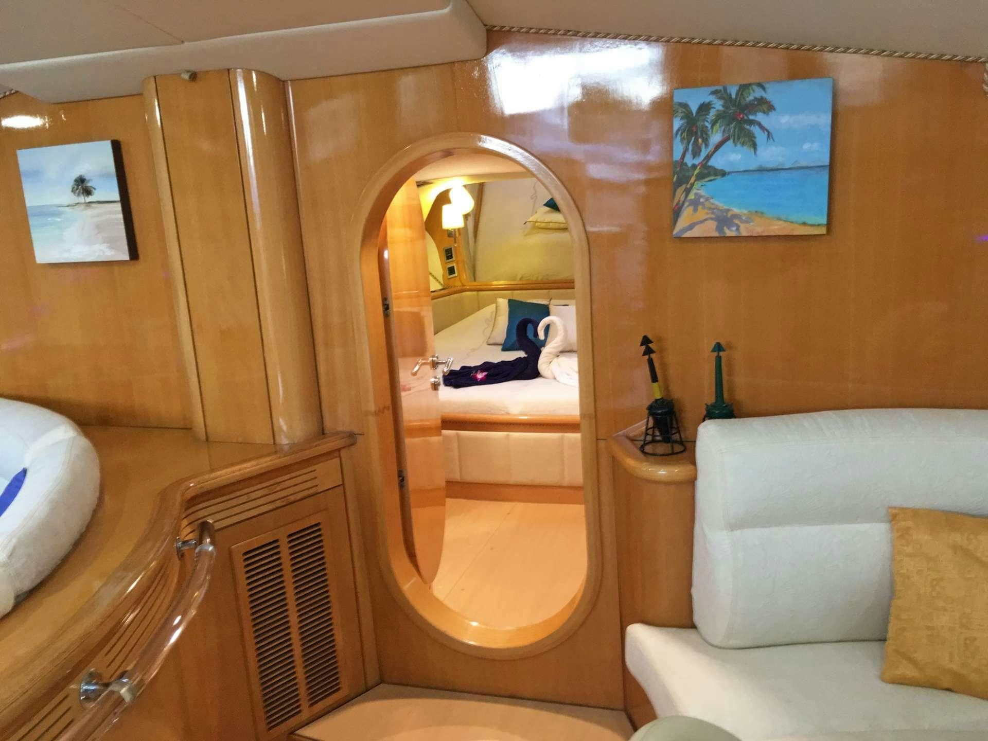 a bathroom with a large mirror aboard SAGITTARIUS Yacht for Charter