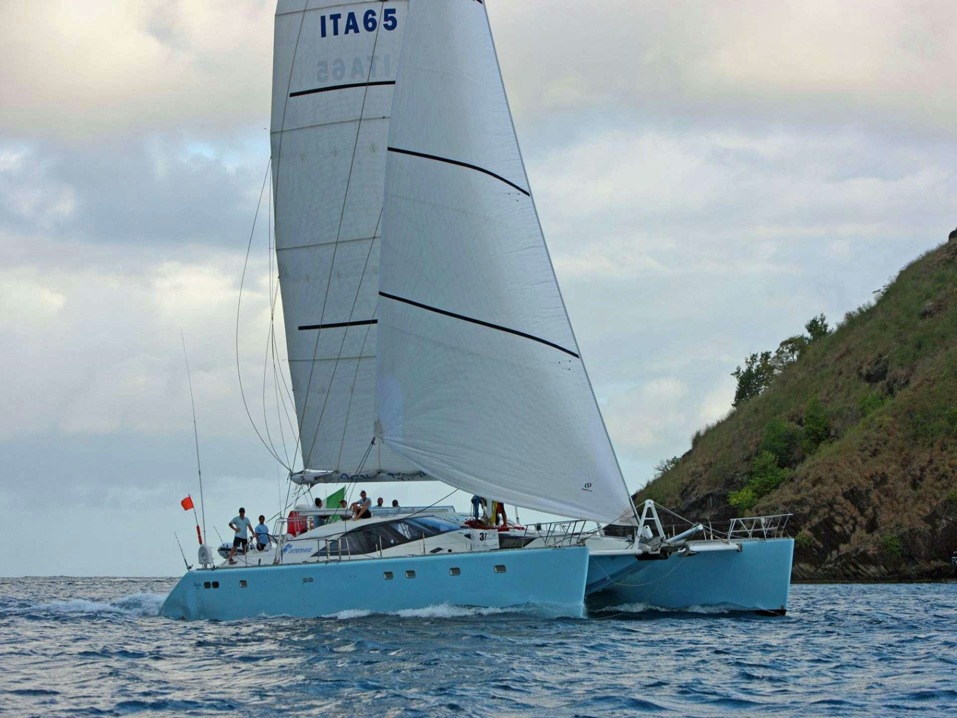 a boat sailing on the water aboard SAGITTARIUS Yacht for Charter