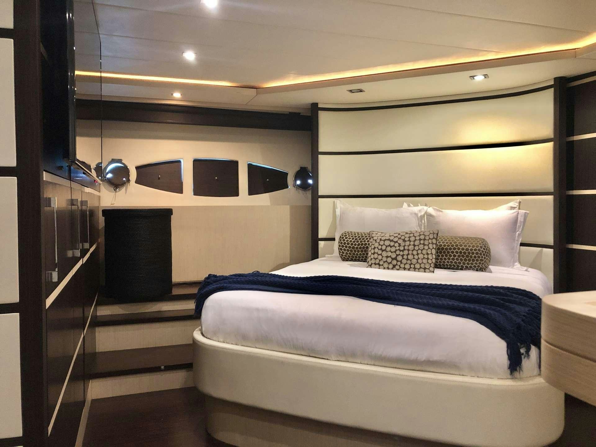 a bed in a room aboard DOLCE VITA Yacht for Charter