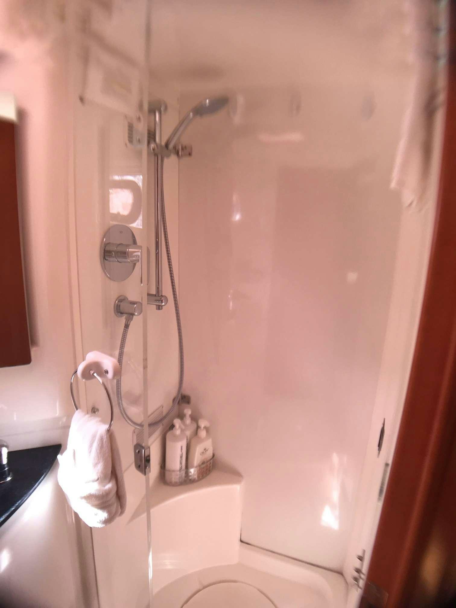 a shower with a toilet aboard STARFISH Yacht for Charter