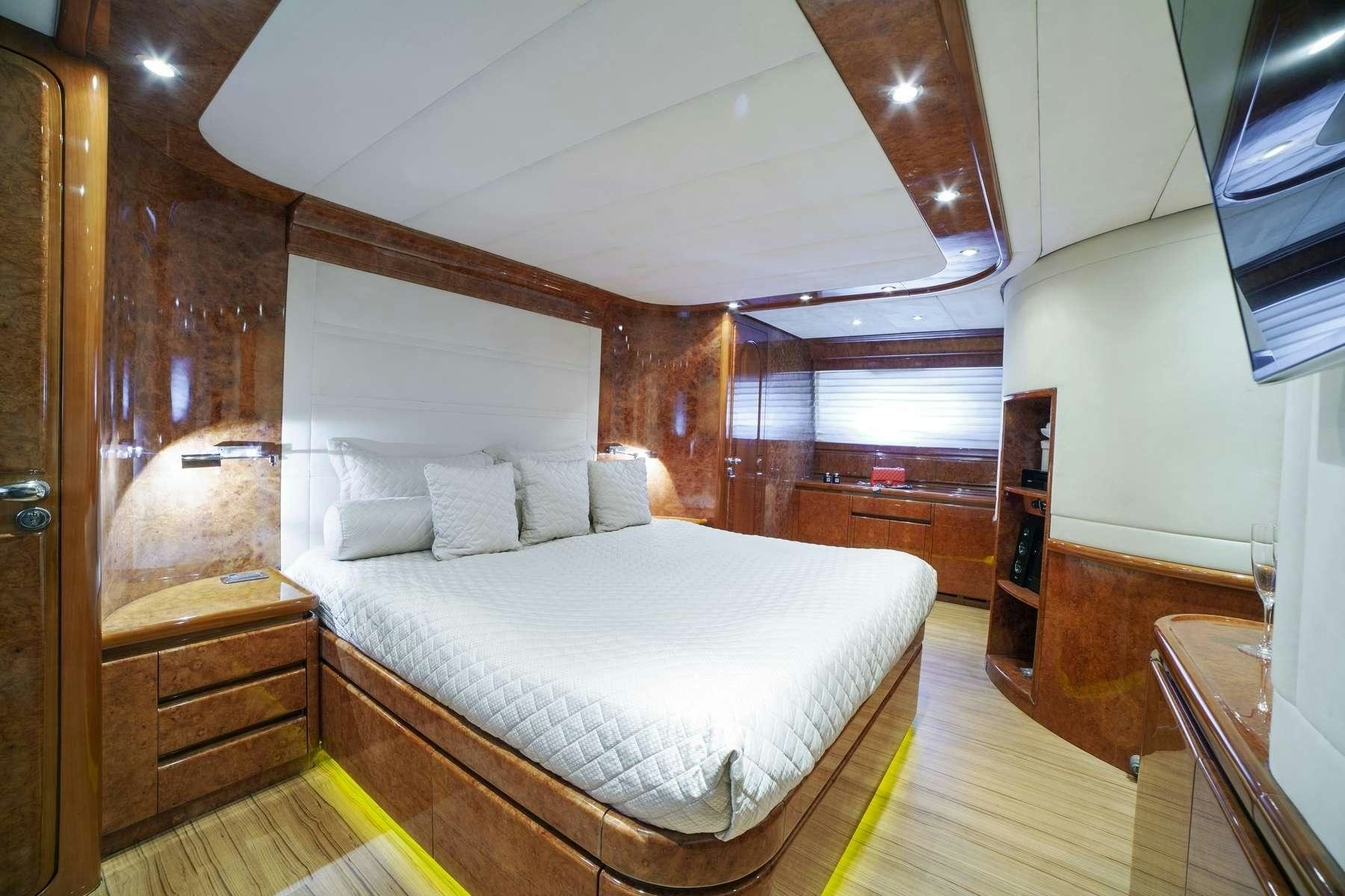 a bed in a room aboard ZOI Yacht for Charter