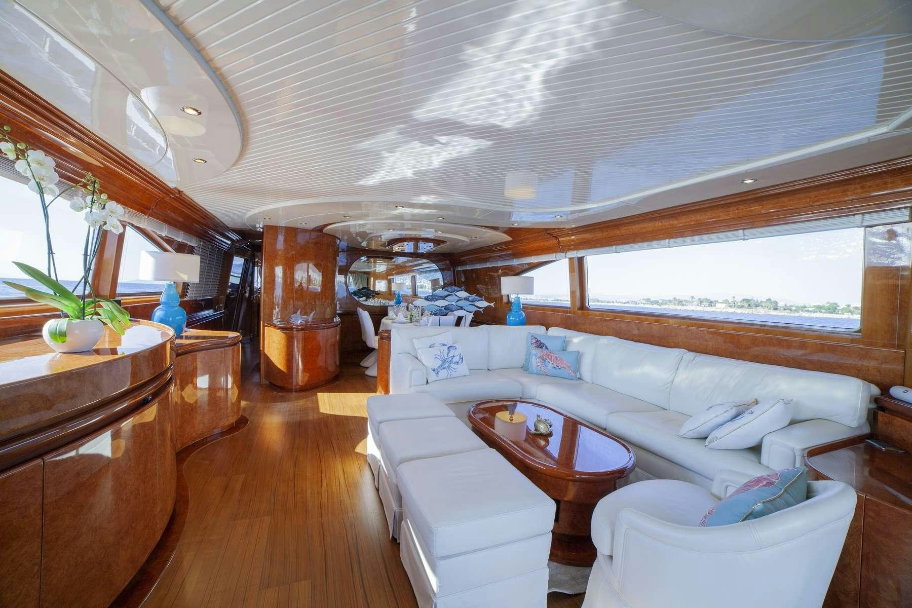 a room with a couch and a table aboard ZOI Yacht for Charter