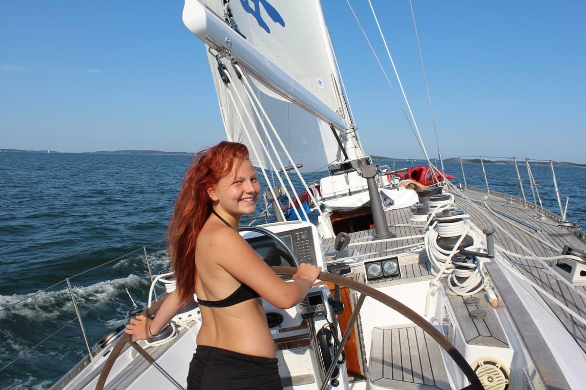 a woman on a boat aboard ICHIBAN Yacht for Charter