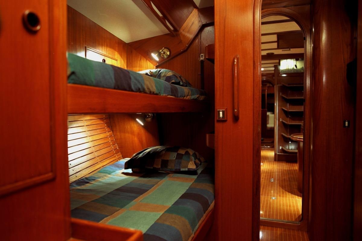 a bed in a room aboard ICHIBAN Yacht for Charter