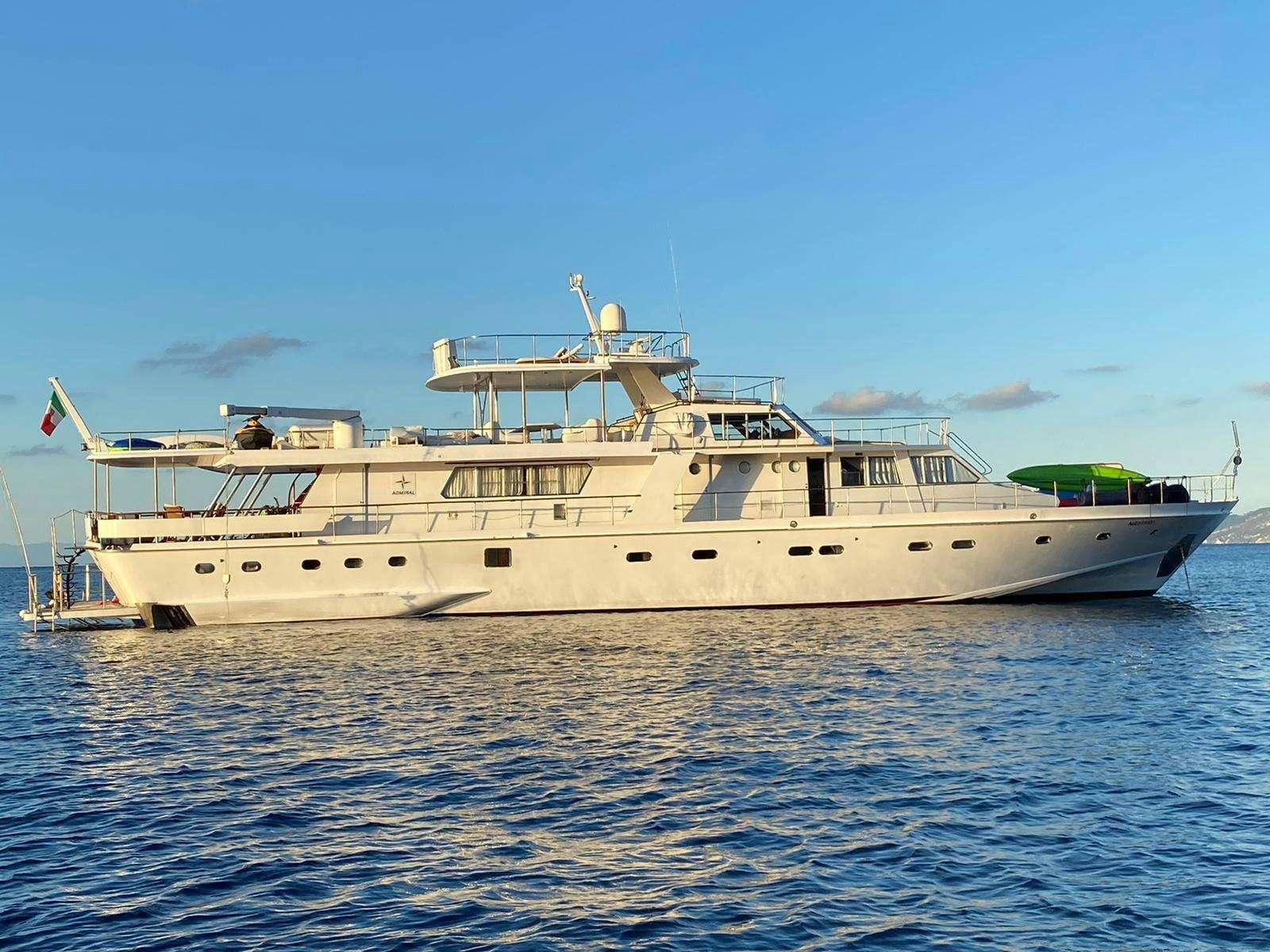 a large white boat on the water aboard Nafisa Yacht for Charter