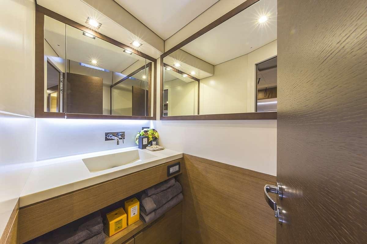 a bathroom with two sinks aboard JIKAN Yacht for Charter