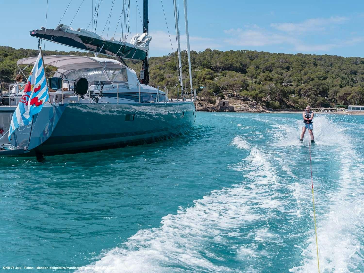 a boat sailing on the water aboard J SIX Yacht for Charter