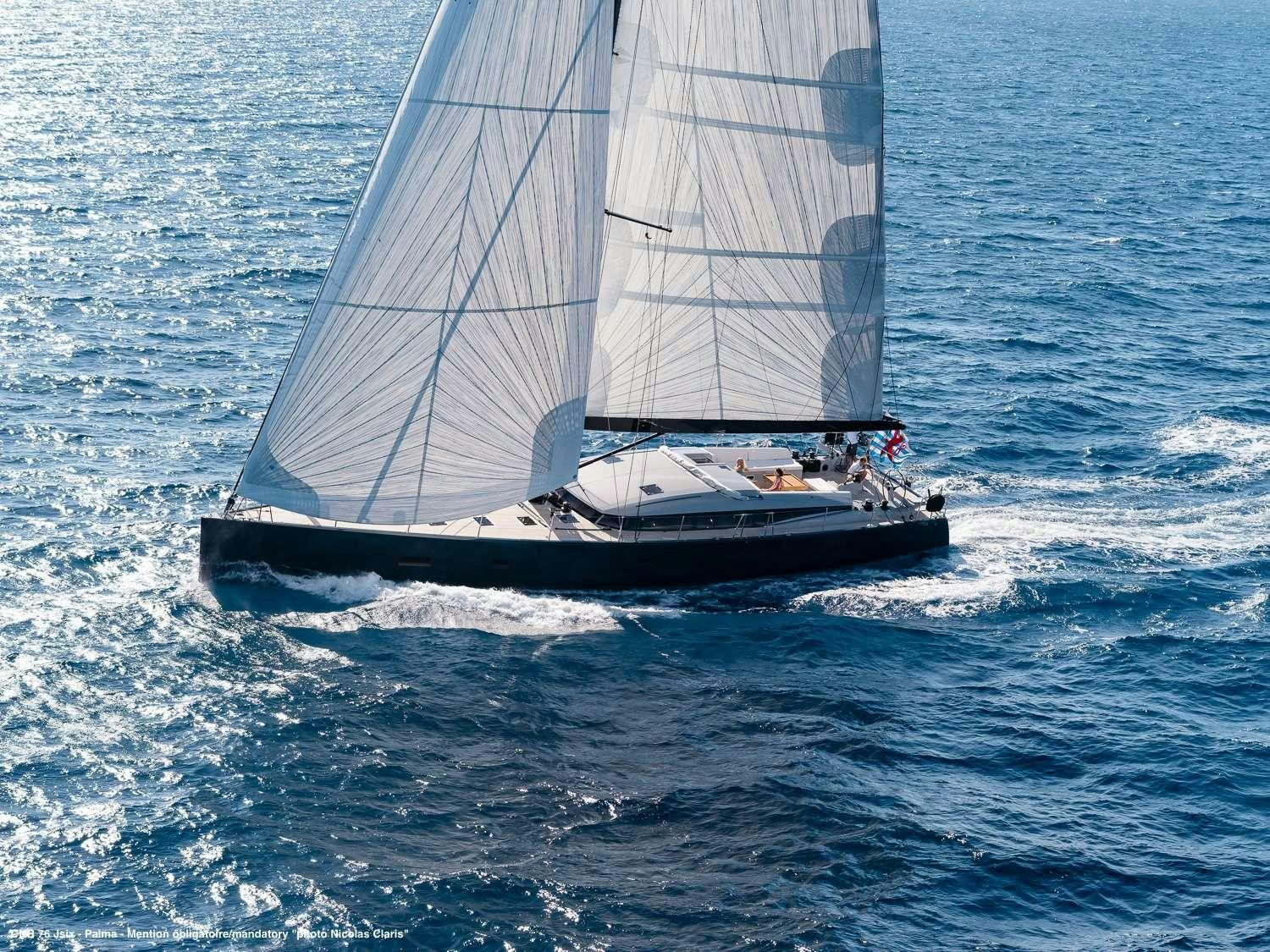 a sailboat on the water aboard J SIX Yacht for Charter