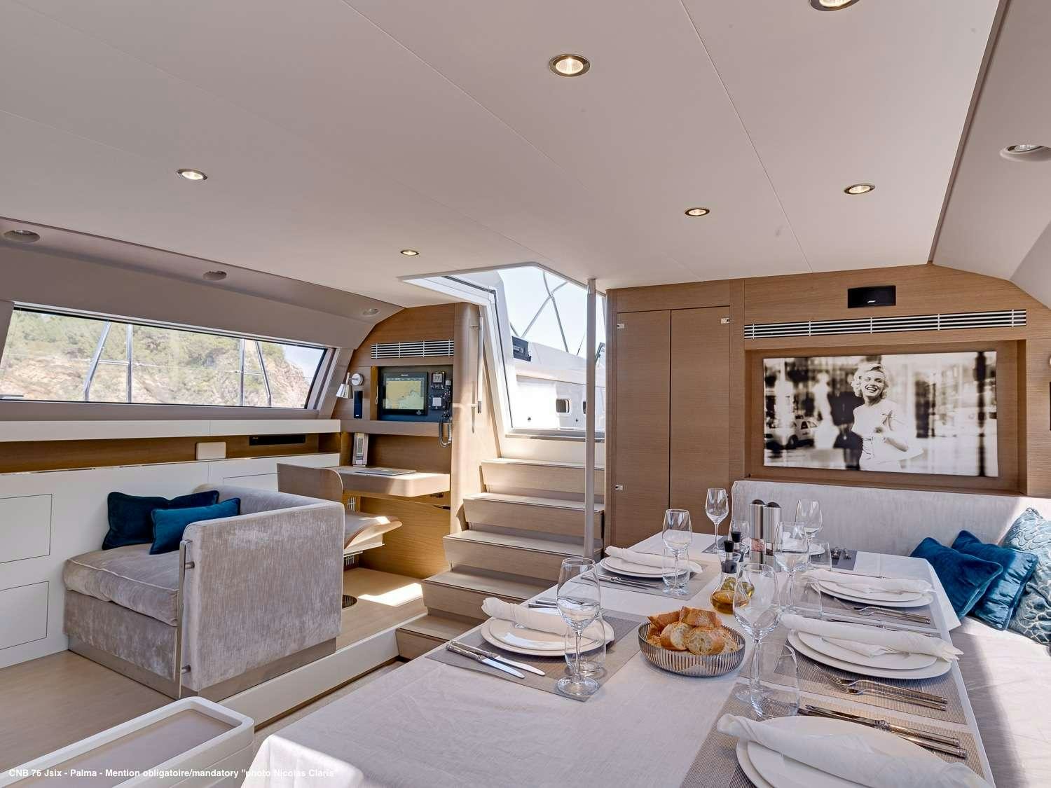 a large modern looking living room aboard J SIX Yacht for Charter