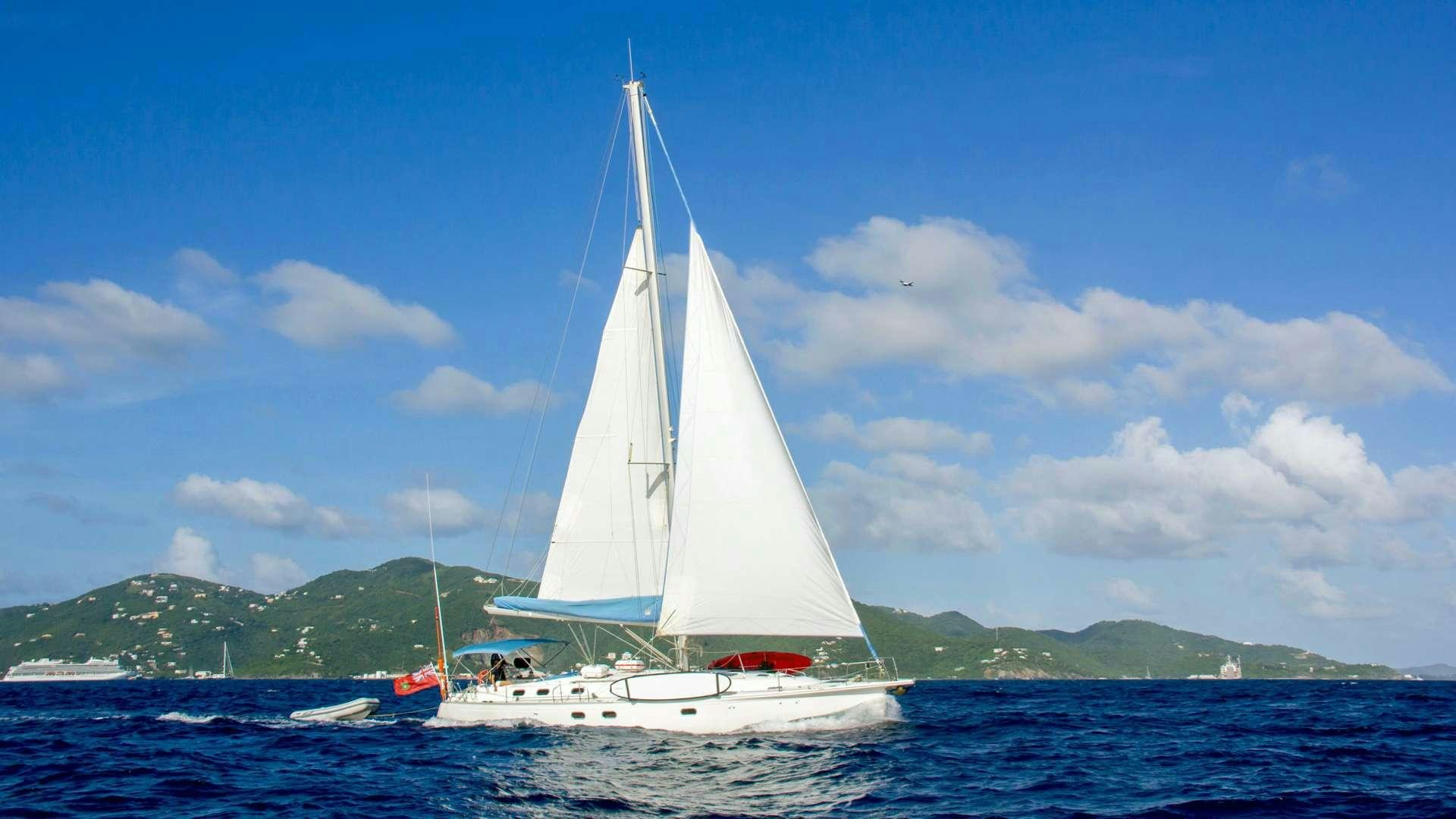 a sailboat in the water aboard NEMO SY Yacht for Charter