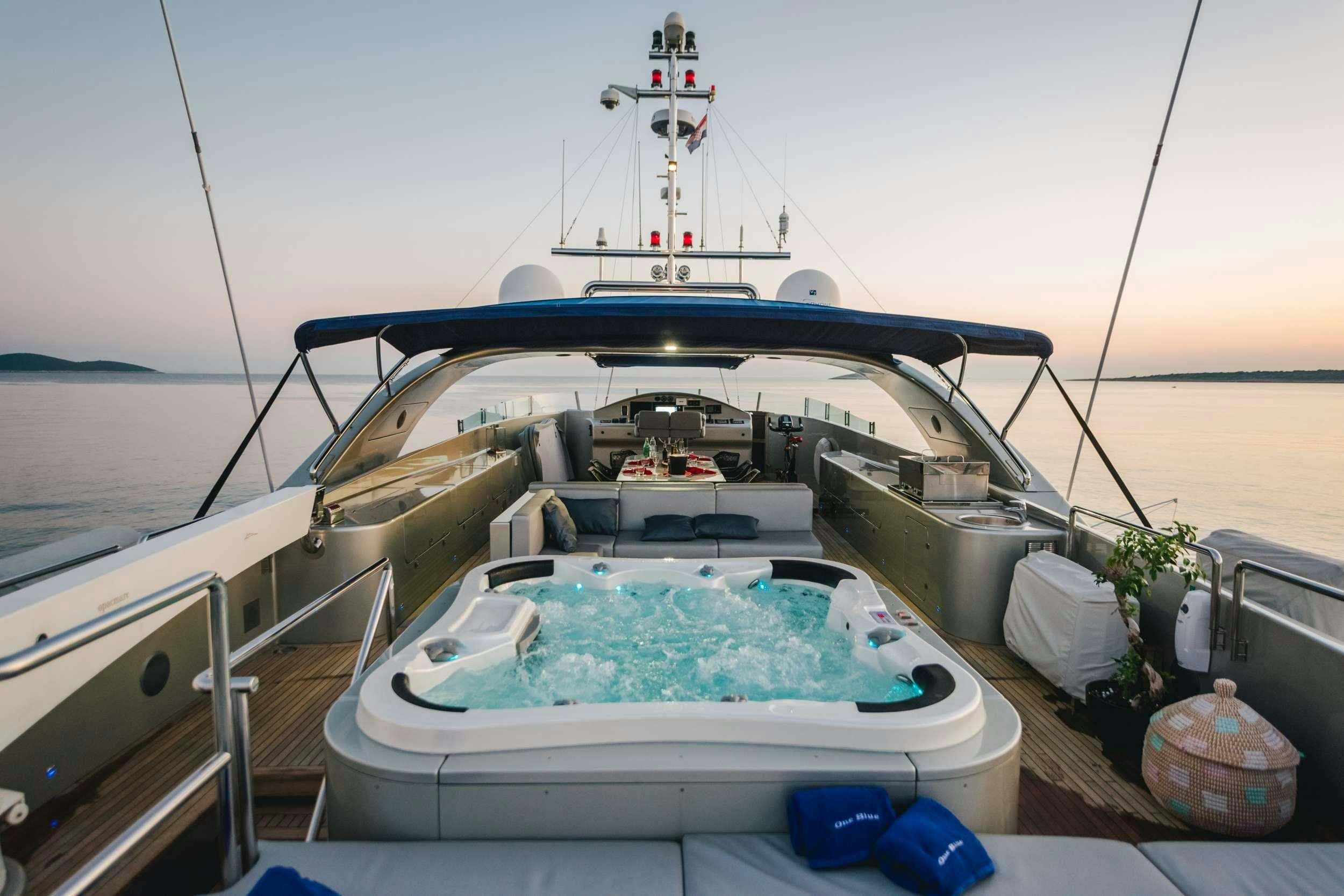 a boat on the water aboard ONE BLUE Yacht for Charter