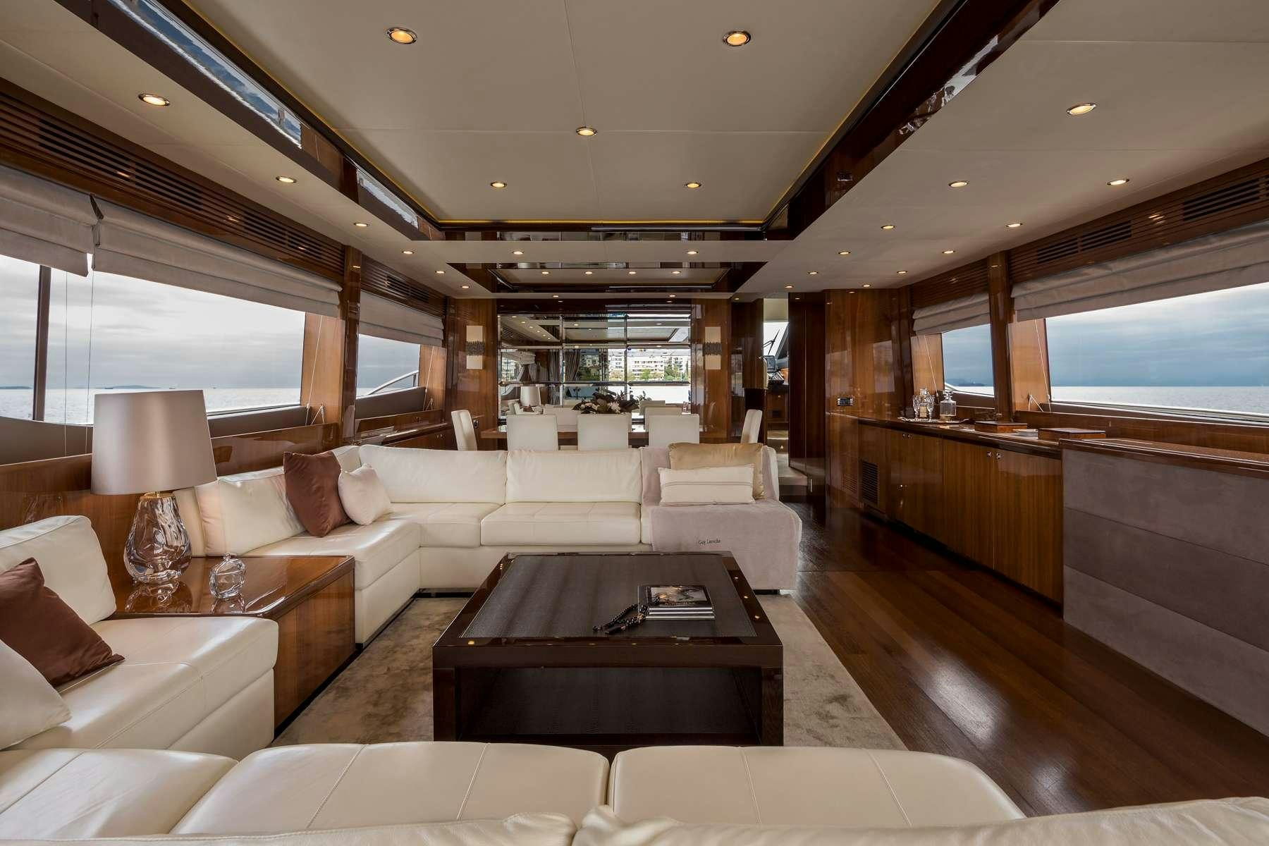 a living room with a large window aboard 4LIFE Yacht for Charter
