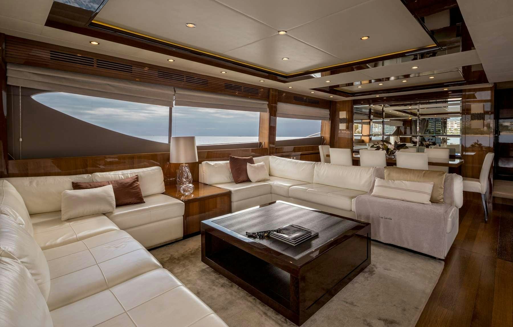 a living room with a large window aboard 4LIFE Yacht for Charter