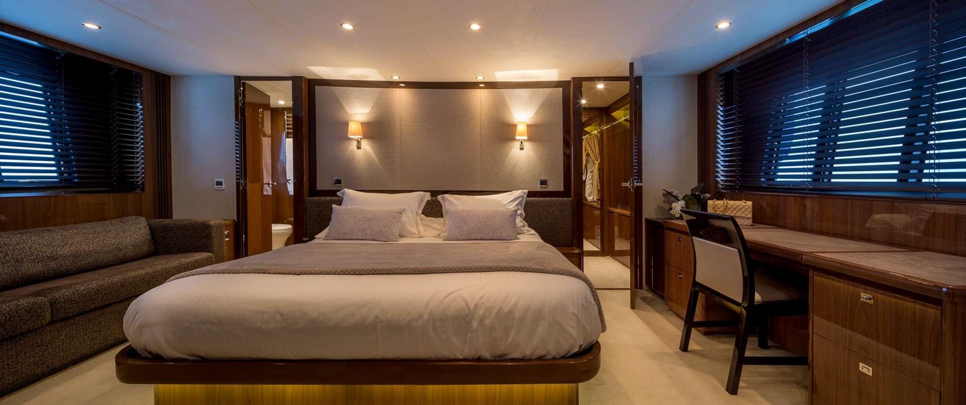 a bed in a room aboard 4LIFE Yacht for Charter