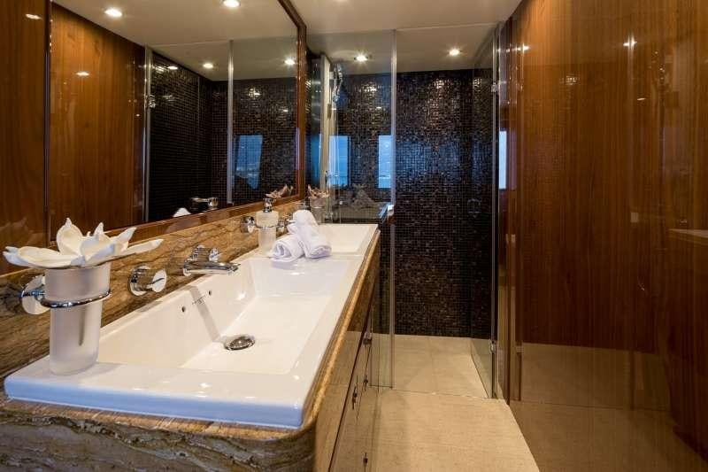 a bathroom with a large tub aboard 4LIFE Yacht for Charter