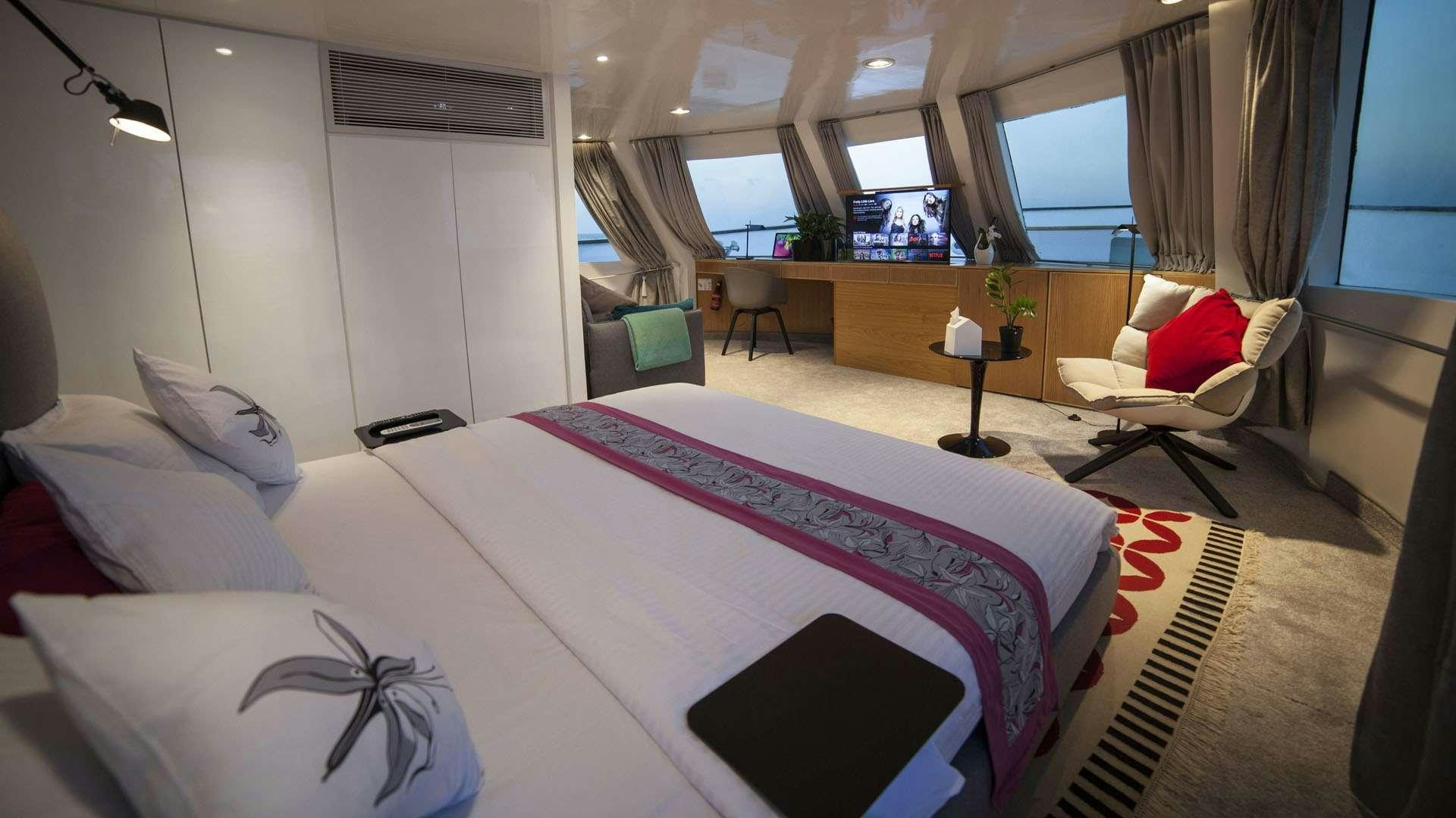 a bed in a room aboard AZALEA Yacht for Charter