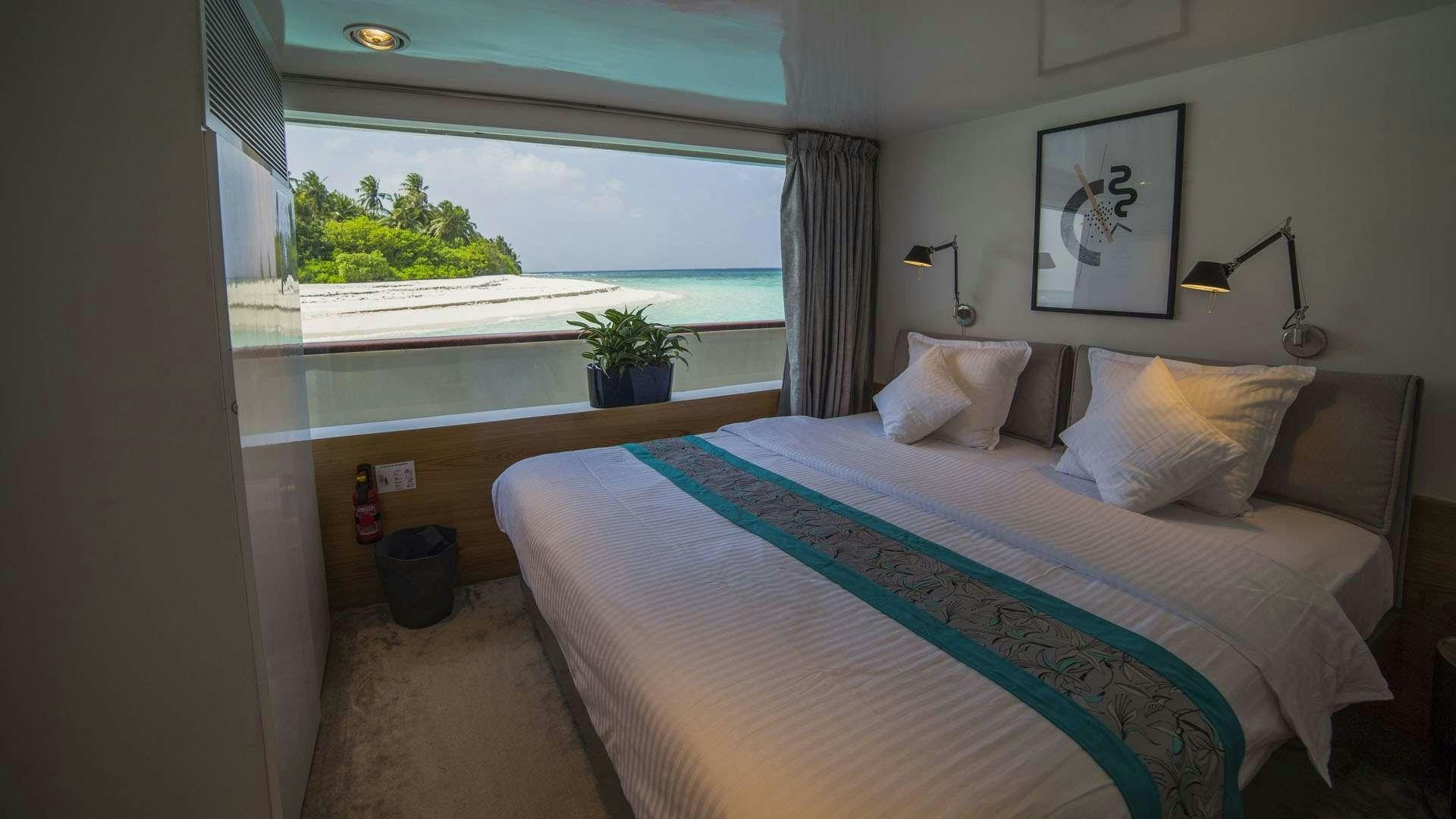 a bed in a room aboard AZALEA Yacht for Charter
