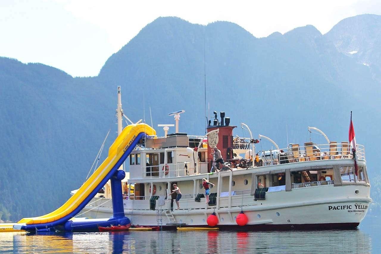 a boat with a group of people on it aboard PACIFIC YELLOWFIN Yacht for Charter