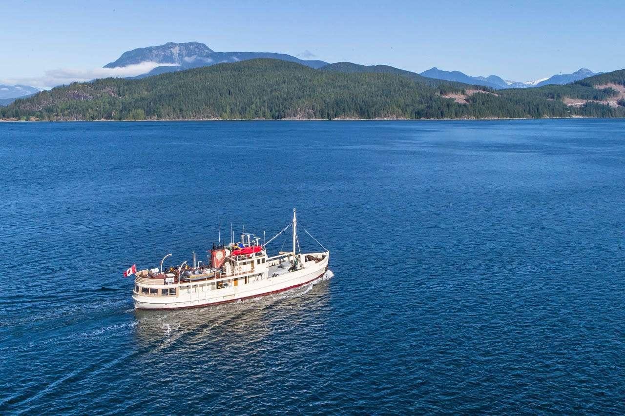 a boat sailing on the water aboard PACIFIC YELLOWFIN Yacht for Charter