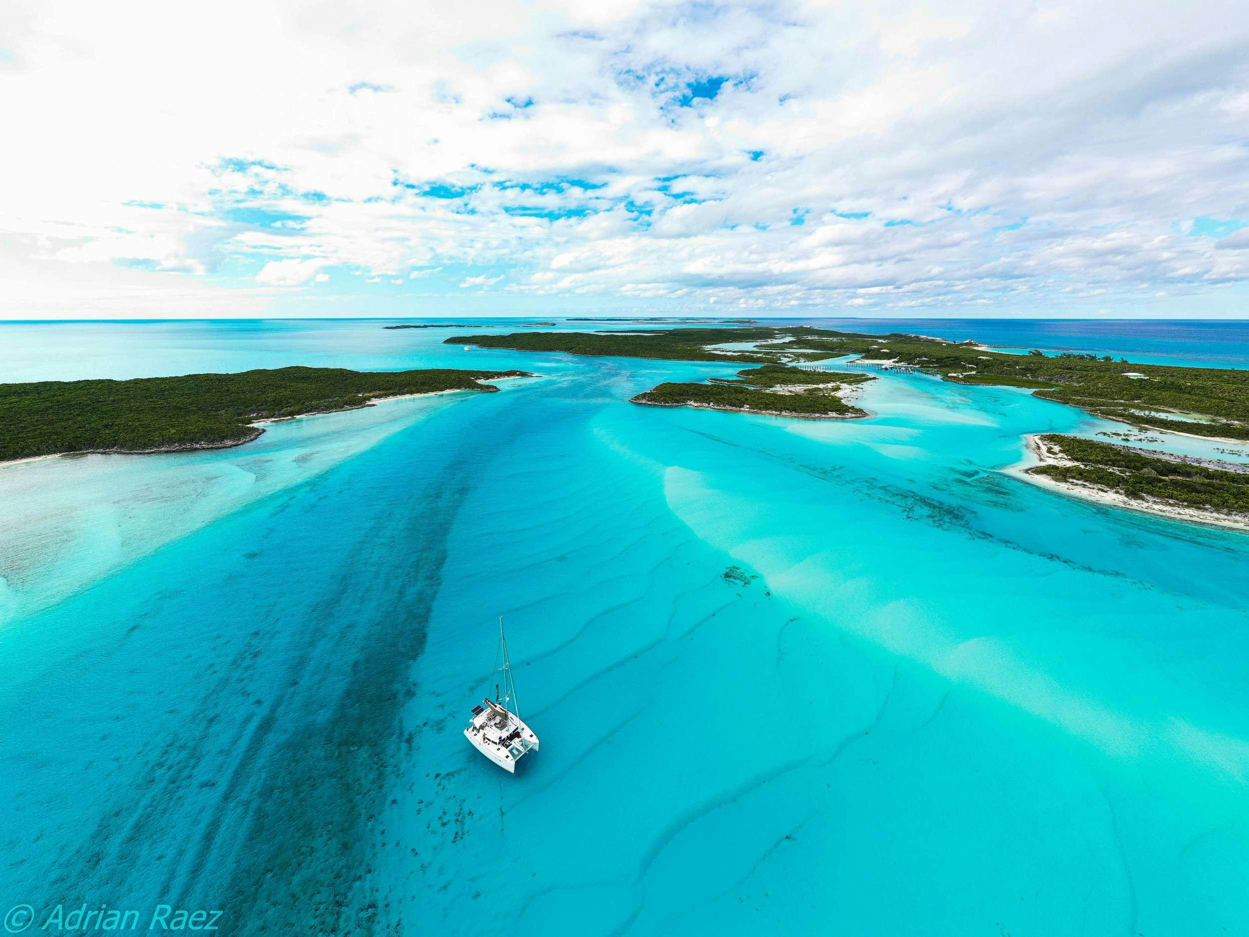 a boat on a beach aboard Madrigal V Yacht for Charter