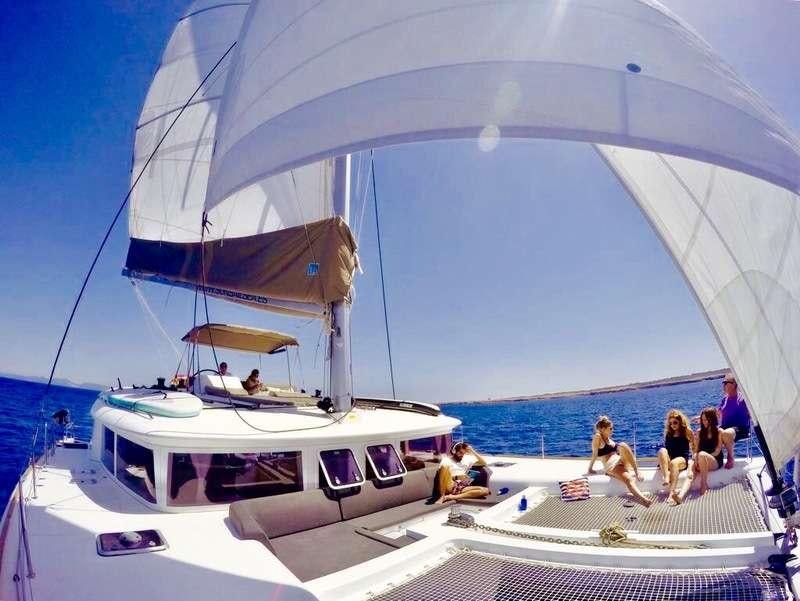 people on a boat aboard Madrigal V Yacht for Charter